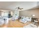 Bright living room featuring hardwood floors and neutral decor at 9805 W Burns Dr, Sun City, AZ 85351
