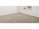 Neutral bedroom with light-colored carpet and a window at 2680 E Santa Rosalia Dr, Casa Grande, AZ 85194