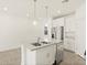 Bright kitchen featuring stainless steel appliances, granite countertops and a center island with sink at 2680 E Santa Rosalia Dr, Casa Grande, AZ 85194