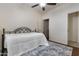 Cozy bedroom features neutral paint and a comfortable daybed with a wrought iron frame at 2903 E Quenton St, Mesa, AZ 85213