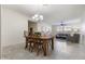 Inviting dining space with decorative chandelier conveniently located off the living room at 2903 E Quenton St, Mesa, AZ 85213