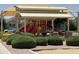 Shaded playground with slides, climbing wall, and picnic tables, providing a fun and safe play area at 2903 E Quenton St, Mesa, AZ 85213