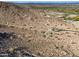 Expansive aerial view shows desert landscape and mountain views perfect for building a custom home at 3388 N Highlands Dr # 38, Buckeye, AZ 85396