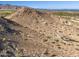Expansive aerial view shows desert landscape and mountain views perfect for building a custom home at 3388 N Highlands Dr # 38, Buckeye, AZ 85396