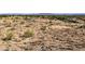 A look at the native desert landscape showcasing the land in this desert community at 3388 N Highlands Dr # 38, Buckeye, AZ 85396