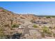 Desert landscape with paths offers opportunities for hiking and outdoor activities in a tranquil setting at 3388 N Highlands Dr # 38, Buckeye, AZ 85396