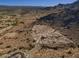Lot with desert landscaping offers a unique opportunity to build a dream home with scenic mountain views at 3388 N Highlands Dr # 38, Buckeye, AZ 85396