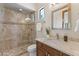 Bathroom featuring a glass shower and modern vanity at 37334 N Winding Wash Trl, Carefree, AZ 85377