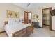Bedroom boasts hardwood floors, and includes access to the bathroom and closet at 37334 N Winding Wash Trl, Carefree, AZ 85377