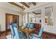 Formal dining room showcasing an elegant chandelier and a dining table with seating for six at 37334 N Winding Wash Trl, Carefree, AZ 85377