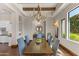 Formal dining room with chandelier and bright, natural light at 37334 N Winding Wash Trl, Carefree, AZ 85377