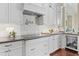 Stylish kitchen features custom cabinets and sleek appliances at 37334 N Winding Wash Trl, Carefree, AZ 85377