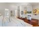 Spacious main bedroom features fireplace, sitting area, and serene decor at 37334 N Winding Wash Trl, Carefree, AZ 85377