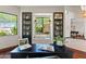 Comfortable office featuring custom built-ins, a window seat, and natural light, ideal for working from home at 37334 N Winding Wash Trl, Carefree, AZ 85377