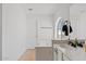 Bright bathroom with white vanity, tub, and shower at 4422 E Dry Creek Rd, Phoenix, AZ 85044