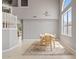 Bright dining room featuring high ceilings, light tile flooring, and a neutral color palette at 4422 E Dry Creek Rd, Phoenix, AZ 85044