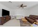 Comfortable living room with a ceiling fan and plenty of seating at 4422 E Dry Creek Rd, Phoenix, AZ 85044