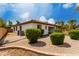 Low maintenance backyard with mature landscaping, decorative rock and desert landscaping at 702 E Capricorn Way, Chandler, AZ 85249