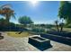 Backyard with well-maintained landscaping and an outdoor lounge area at 702 E Capricorn Way, Chandler, AZ 85249