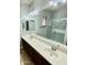 Bathroom with double sink vanity and a large mirror at 702 E Capricorn Way, Chandler, AZ 85249