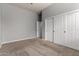 Bedroom features neutral carpet and closet with white sliding doors at 702 E Capricorn Way, Chandler, AZ 85249