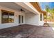 Spacious covered patio with a ceiling fan and a view of the backyard and landscaping at 702 E Capricorn Way, Chandler, AZ 85249