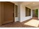 The home's front door has a decorative window at 702 E Capricorn Way, Chandler, AZ 85249