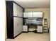 Organized garage with custom built-in cabinets and workbench at 702 E Capricorn Way, Chandler, AZ 85249