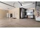 Spacious garage featuring abundant built-in storage with a counter, plus side refrigerator at 702 E Capricorn Way, Chandler, AZ 85249