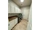 Spacious laundry room with cabinets and counter space at 702 E Capricorn Way, Chandler, AZ 85249