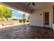 Spacious covered patio with stamped concrete floors, backyard access, and a fire pit at 702 E Capricorn Way, Chandler, AZ 85249