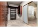 A stylish walk-in closet with custom shelves and drawers leading to shower at 702 E Capricorn Way, Chandler, AZ 85249