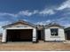 New construction single-story home with a two-car garage and unfinished roof at 7700 W Saddlehorn Rd, Peoria, AZ 85383
