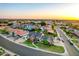 Expansive aerial shot of a home with lush greenery, offering a glimpse of a peaceful residential area at 908 N Creston --, Mesa, AZ 85213