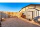 Brick-paved backyard showcasing a shed, workspace, and ample storage options at 908 N Creston --, Mesa, AZ 85213