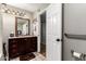 Bathroom featuring a vanity with dark wood cabinets and tile floors at 908 N Creston --, Mesa, AZ 85213