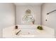 A luxurious bathtub featuring a window with stained glass and greenery at 908 N Creston --, Mesa, AZ 85213