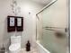 Bathroom featuring a toilet, shower, and decorative towels at 908 N Creston --, Mesa, AZ 85213