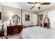 Bedroom featuring a four-poster bed, neutral decor, and a vanity at 908 N Creston --, Mesa, AZ 85213