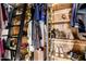 Nicely organized closet with a ladder, plenty of room to hang clothes, and room for shoes and other belongings at 908 N Creston --, Mesa, AZ 85213