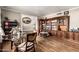 Charming dining area with a glass table, ornate chairs, and built-in bookcases at 908 N Creston --, Mesa, AZ 85213