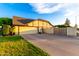 Attached two-car garage and large driveway offering ample parking at 908 N Creston --, Mesa, AZ 85213