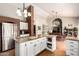 Kitchen island with granite countertops, stainless appliances and open concept to the dining room at 908 N Creston --, Mesa, AZ 85213