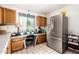 Bright kitchen featuring stainless-steel refrigerator and breakfast nook at 908 N Creston --, Mesa, AZ 85213