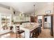 Bright kitchen island with granite countertops, breakfast bar seating and modern appliances at 908 N Creston --, Mesa, AZ 85213