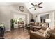 Inviting living room featuring vaulted ceiling, lots of natural light, and comfortable seating at 908 N Creston --, Mesa, AZ 85213