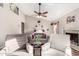Bright living room featuring a fireplace, ceiling fan, and hardwood floors at 908 N Creston --, Mesa, AZ 85213