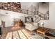 Bright living room with high ceilings, bar area, staircase, and lots of natural light at 908 N Creston --, Mesa, AZ 85213