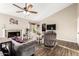 Living room with a fireplace, hardwood floors, and vaulted ceilings at 908 N Creston --, Mesa, AZ 85213