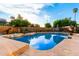 Sparkling pool surrounded by a lush yard, perfect for relaxing and entertaining on sunny days at 908 N Creston --, Mesa, AZ 85213